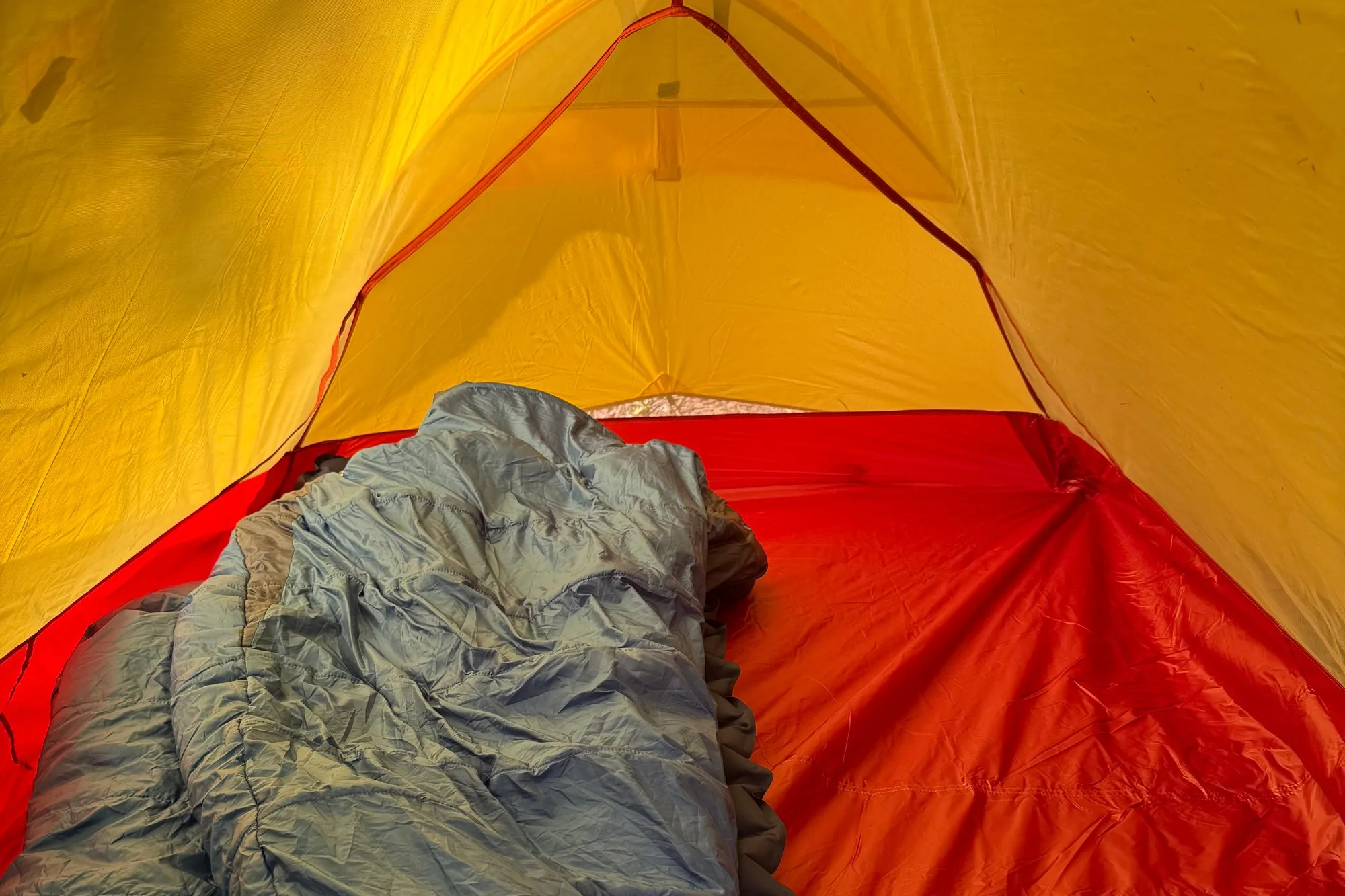 Inside the Bryce 2P, sleeping bag on one side with floor space to spare