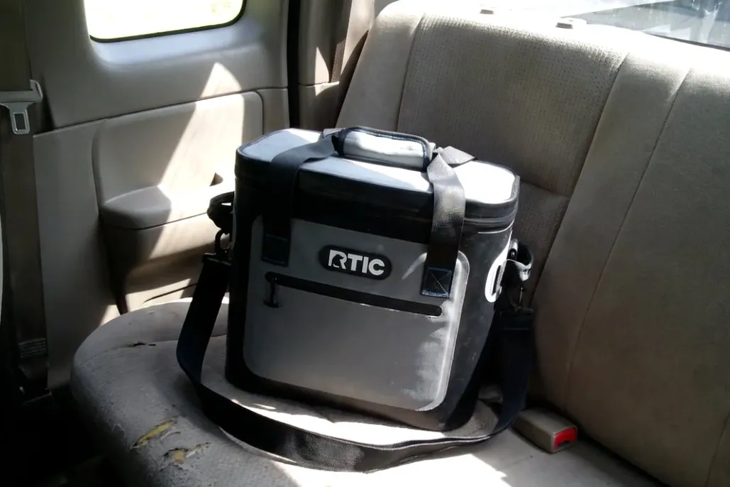 My RTIC soft cooler riding in the back seat of the truck, the one I load with drinks