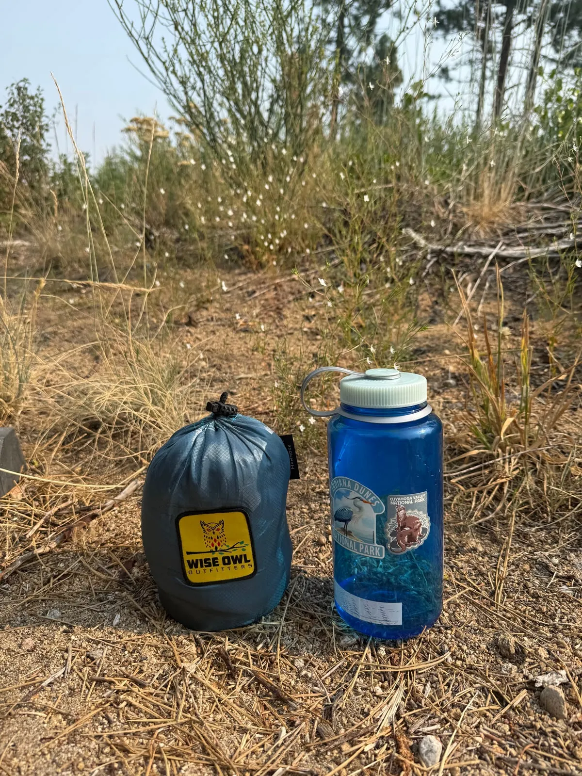 The packed DoubleOwl next to a 32 oz Nalgene for scale